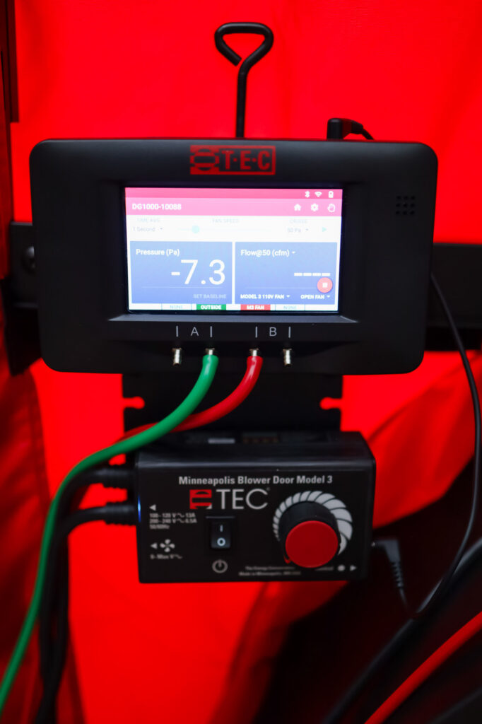 meter on blower door test equipment